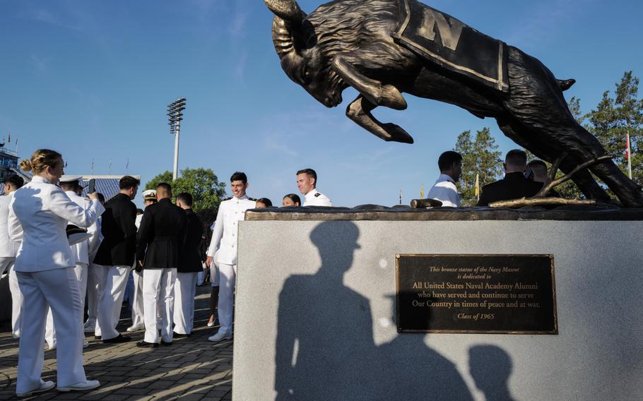 Naval Academy graduates gather before the May 26, 2023, commissioning ceremony in Annapolis.