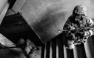 Rodriguez Live Fire Range, South Korea, June 4, 2017: Soldiers from 1st Battalion, 5th Infantry Regiment, 1st Stryker Brigade Combat Team, 25th Infantry Division out of Fort Wainwright, Alaska, keep watch over a stairwell during a drill.

Read the story and find additional photos here: https://www.stripes.com/news/alaska-based-bobcats-work-on-building-lethality-during-korea-rotation-1.472013

META TAGS: 1st Battalion, 5th Infantry Regiment, 1st Stryker Brigade Combat Team, 25th Infantry Division; U.S. Army; training exercise; 