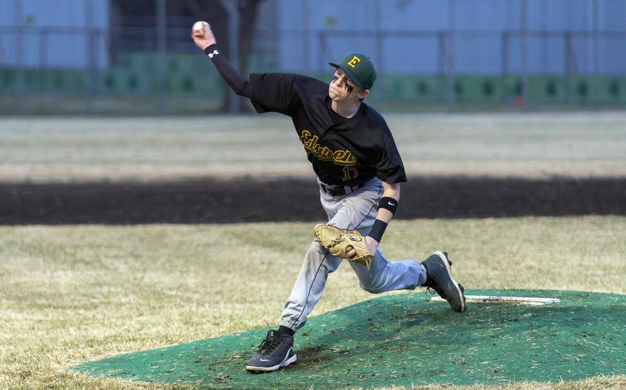 Levi Kuns pitches.