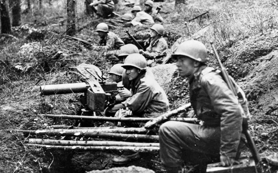 Members of the 22nd Infantry Regiment holding the line during heavy fighting in the Battle of the Hurtgen Forest on Dec. 1, 1944. 