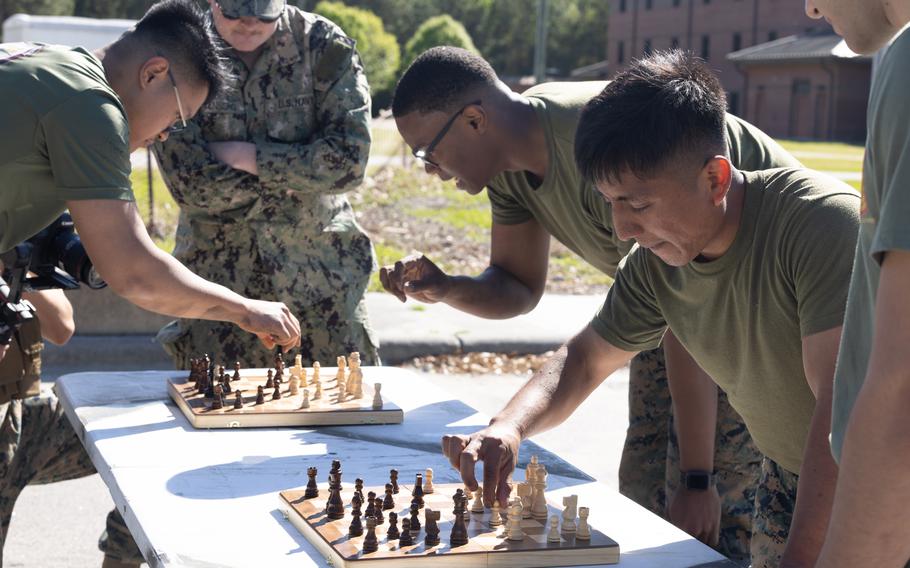 Marines play chess together