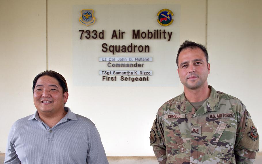 Air Force Staff Sgt. Kyle Kemble, right, and civilian employee Brandon Yoneda got the surprise of a lifetime on June 13, 2021, when they came across a group of exhausted Japanese kayakers bobbing in the sea off the western coast of Okinawa.