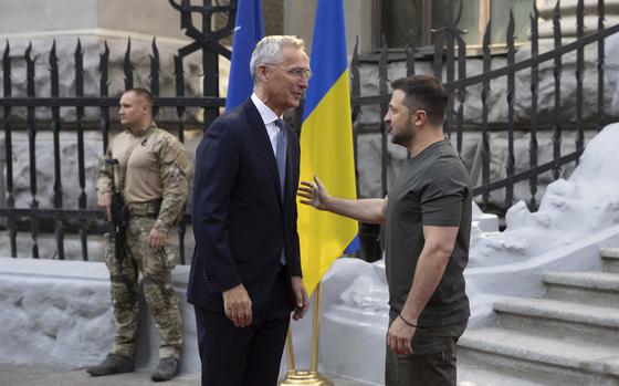 NATO Secretary General Jens Stoltenberg, left, and Ukrainian President Volodymyr Zelenskyy talk during their meeting in Kyiv, Ukraine, Thursday, Sept. 28, 2023. (Ukrainian Presidential Press Office via AP)