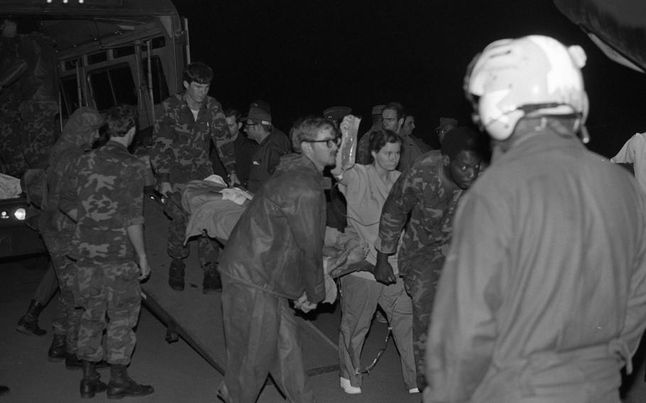 A victim on a stretcher.