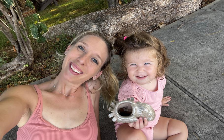 Bella Kuykendall, now 2, with her mother Kate Kuykendall, an Army spouse.