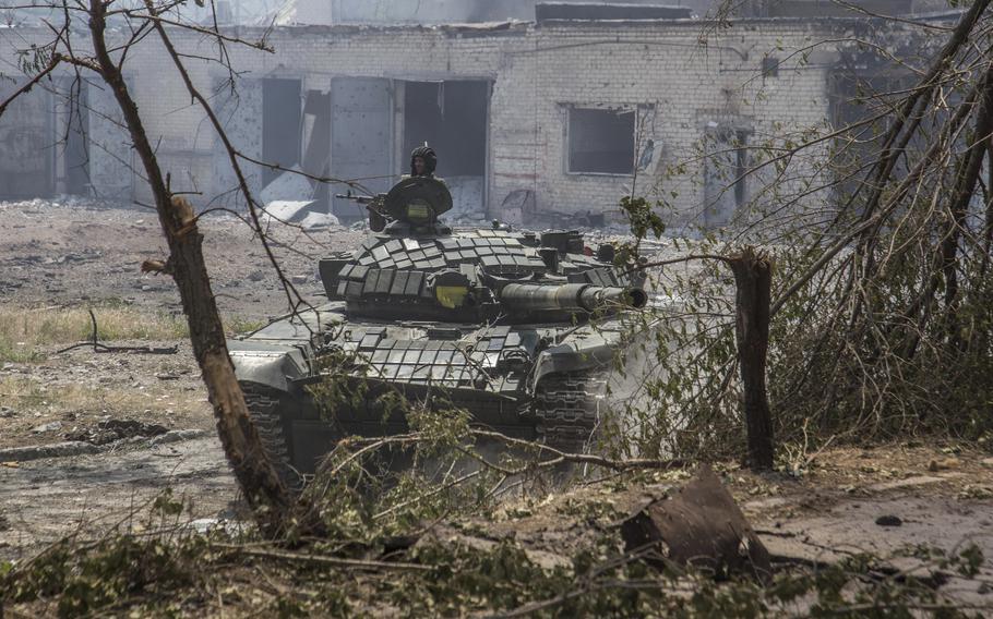 A Ukrainian tank is in position during heavy fighting on the front line in Severodonetsk, the Luhansk region, Ukraine, Wednesday, June 8, 2022. 