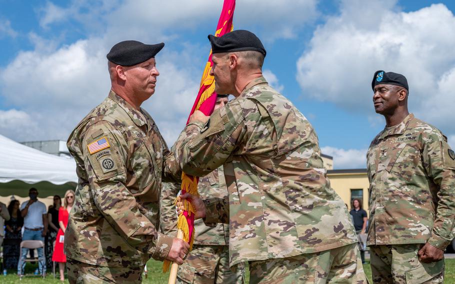 Sgt. Maj. Michael J. Wiles assumes responsibility as Sergeant Major of Tobyhanna Army Depot on June 28, 2021, as the new commander, Col. Daniel Horn, passes the flag.