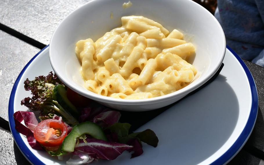 The kids’ mac and cheese comes with a small salad at the Boardwalk Cafe Bar on the Felixstowe Pier in Felixstowe, England. 