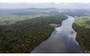 The Essequibo River flows through Kurupukari crossing in Guyana on Nov. 19, 2023. Venezuela has long claimed Guyana’s Essequibo region, a territory larger than Greece and rich in oil and minerals.