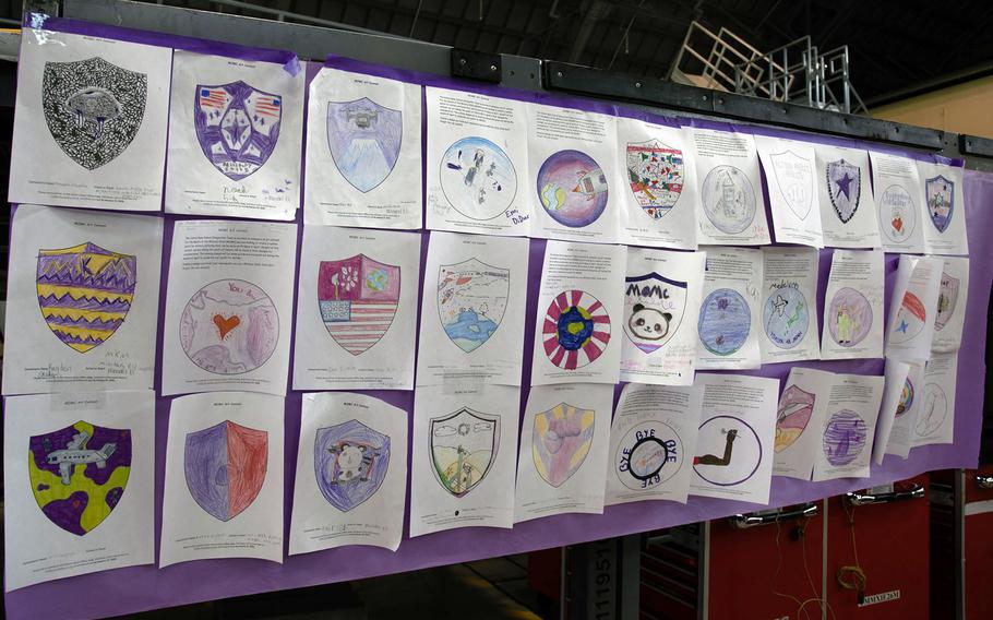 Student submissions for a Month of the Military Child morale patch are displayed at Yokota Air Base, Japan, Tuesday, April 11, 2023.