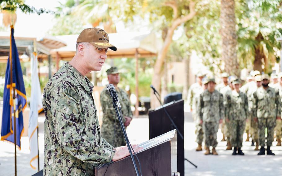 Vice Adm. George M. Wikoff, commander of U.S. Naval Forces Central Command/U.S. 5th Fleet, speaks at a memorial service marking 20 years since the killing of three service members from the USS Firebolt.