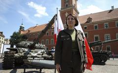 Deputy Minister of Defense of Ukraine, Hanna Maliar, poses for a picture during an opening of an open-air exhibition of damaged and burned Russian tanks and armored vehicles at the Castle Square in Warsaw, Poland, Monday, June 27, 2022. The vehicles were captured by Ukraine military forces. Ukraine authorities announced that there are plans for similar exhibits in other European capitals such as Berlin, Paris, Madrid and Lisbon. 