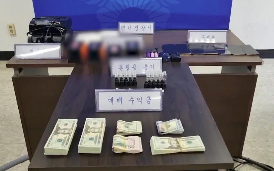 This undated image, censored by police, shows evidence collected after a synthetic cannabis raid in Pyeongtaek, South Korea.