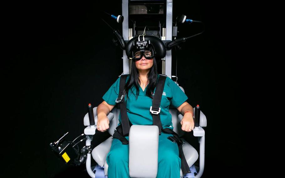Danierys Font, 42, a senior administrative assistant at the University of Miami’s Miller School of Medicine, sits in a rotary chair used to diagnose diplomatic personnel who experienced neurosensory symptoms after exposure to a unique sound/pressure phenomenon in Havana.