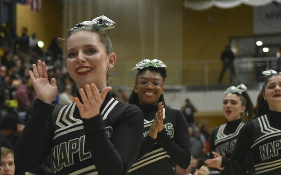 Haley Schmidt claps with her Naples teammates as they walk to receive their championship plaque at the closing ceremony of the 2024 DODEA-Europe Cheerleading Championships in Wiesbaden, Germany on Friday, Feb. 16, 2024. Naples won the Division II championship. 