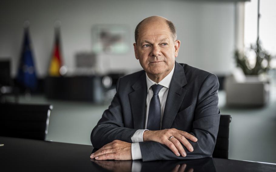 German Chancellor Olaf Scholz poses during an interview in his office at the Chancellery, in Berlin, Germany, Friday June 17, 2022. (Michael Kappeler/dpa via AP)