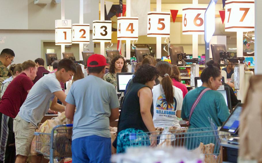 Patrons flock to the Camp Foster commissary, Thursday, Aug. 3, 2023, to stock up on supplies in the wake of Typhoon Khanun. 