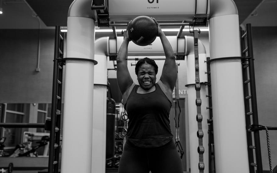 Anderson fights through her hour-long workout routine in March at a gym near her Houston home. 