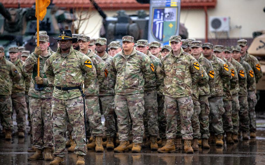 U.S. soldiers of the 1st Cavalry Division stand in formation during a ceremony in Bemowo Piskie, Poland, on Feb. 2, 2023. According to a new Brookings Institution policy analysis, the U.S. should consider modestly increasing troop levels in Poland, particularly in the east near the Suwalki Gap.