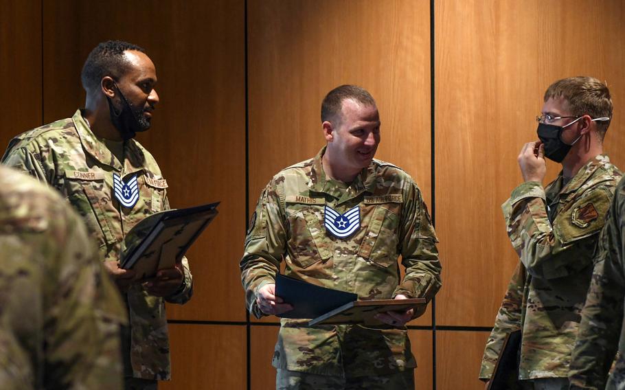 Airmen celebrate during a technical sergeant promotion release celebration at Tyndall Air Force Base, Fla., July 1, 2021. 
