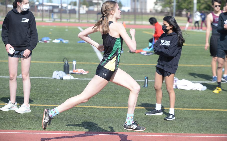 Robert D. Edgren senior and reigning Far East cross country champion Morgan Erler heads for a victorious finish in the 3,200 during Saturday’s DODEA-Japan district finals. She swept the 3,200, 1,600 and 800.
