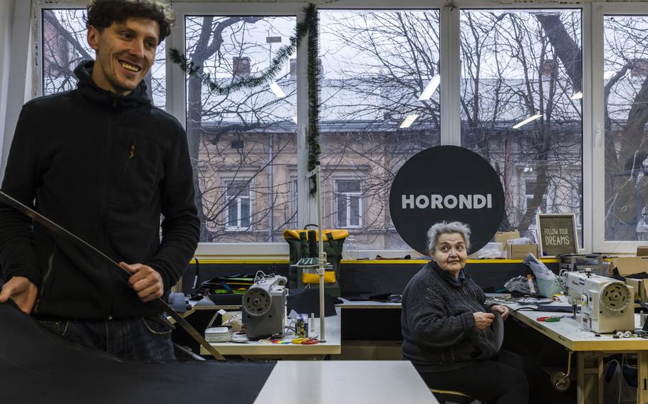 Halyna Butenko, right, on March 8 in Lviv, where she is helping Sasha Horondi make bulletproof vests. 