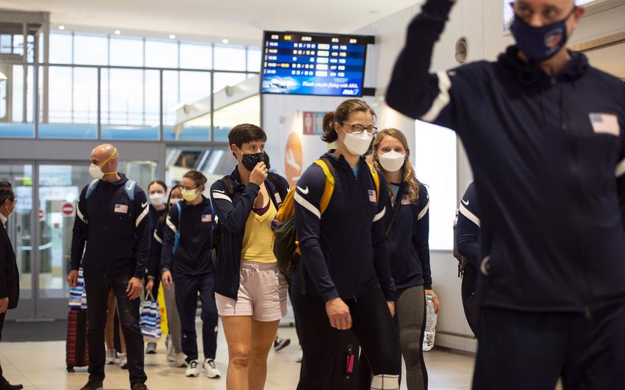 Members of the U.S. women’s Olympic fencing team arrive at Marine Corps Air Station Iwakuni, Japan, Tuesday July 13, 2021. 