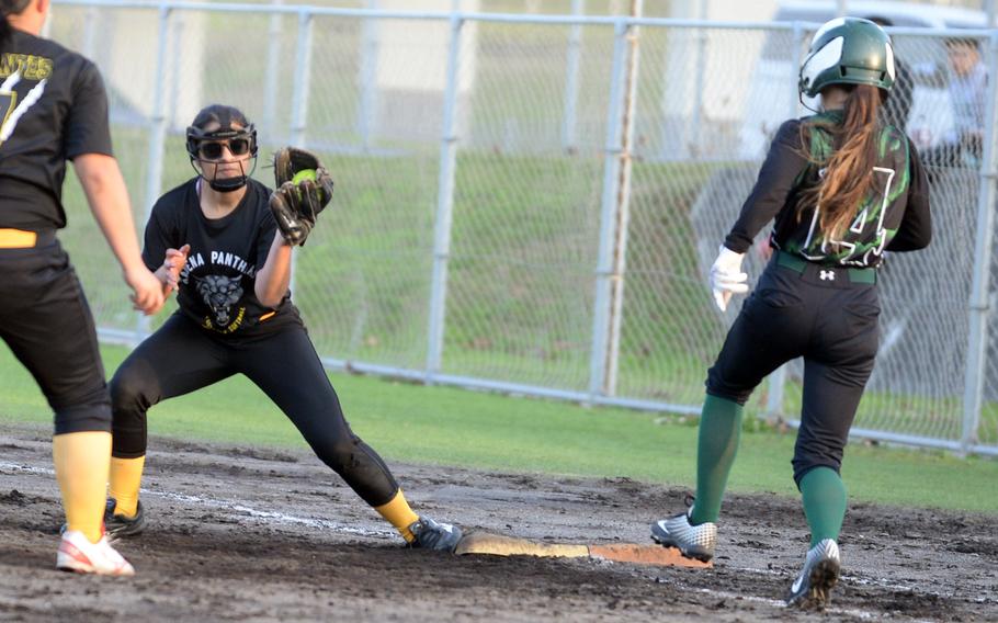 Kadena second baseman Ani Mendoza steps on first base to erase Kubasaki baserunner Jenelle Glade on a fielder's choice during Tuesday's DODEA-Okinawa softball game. The Panthers won 8-2 and took a 2-0 season-series lead.