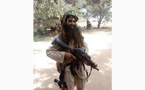 Islamic State group commander Abu Huzeifa, known by the alias Higgo, poses in uniform In 2018. Mali's army said Monday, April 29, 2024, that Huzeifa was killed by Malian state forces. 