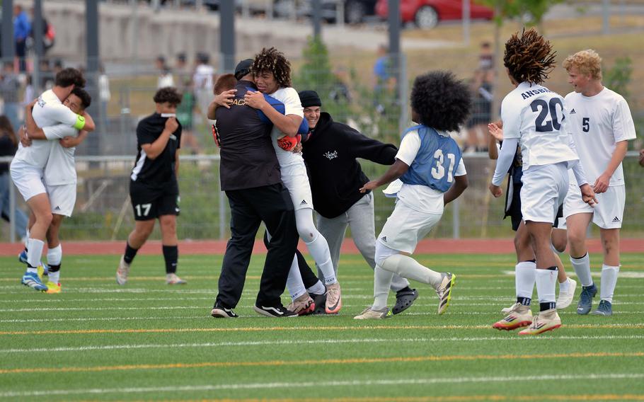 The Ansbach Cougars celebrate their boys Division III title after beating Alconbury 1-0 at the DODEA-Europe soccer championships in Ramstein, Germany, May 22, 2025.