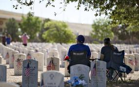 Guests visit the Fort Bliss National Cemetery on Memorial Day, May 26, 2025, in El Paso, Texas. In 2007, the U.S. Department of Veterans Affairs facility became the first national cemetery to adopt a xeriscape landscape in response to the arid West Texas climate and water conservation needs. Traditional turf grass was replaced with decomposed granite and drought-tolerant native plants. It is one of only three National Cemetery Administration xeriscape national cemeteries.