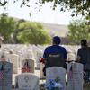 Guests visit the Fort Bliss National Cemetery on Memorial Day, May 26, 2025, in El Paso, Texas. In 2007, the U.S. Department of Veterans Affairs facility became the first national cemetery to adopt a xeriscape landscape in response to the arid West Texas climate and water conservation needs. Traditional turf grass was replaced with decomposed granite and drought-tolerant native plants. It is one of only three National Cemetery Administration xeriscape national cemeteries.
