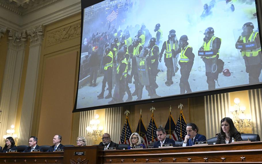 The House Jan. 6 committee reviews footage from past hearings at a Dec. 19, 2022, meeting. 