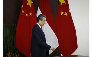 Chinese Foreign Minister Wang Yi arrives for a bilateral meeting with Indonesian Foreign Minister Retno Marsudi in Jakarta, Indonesia, Thursday, April 18, 2024. (Willy Kurniawan/Pool Photo via AP)