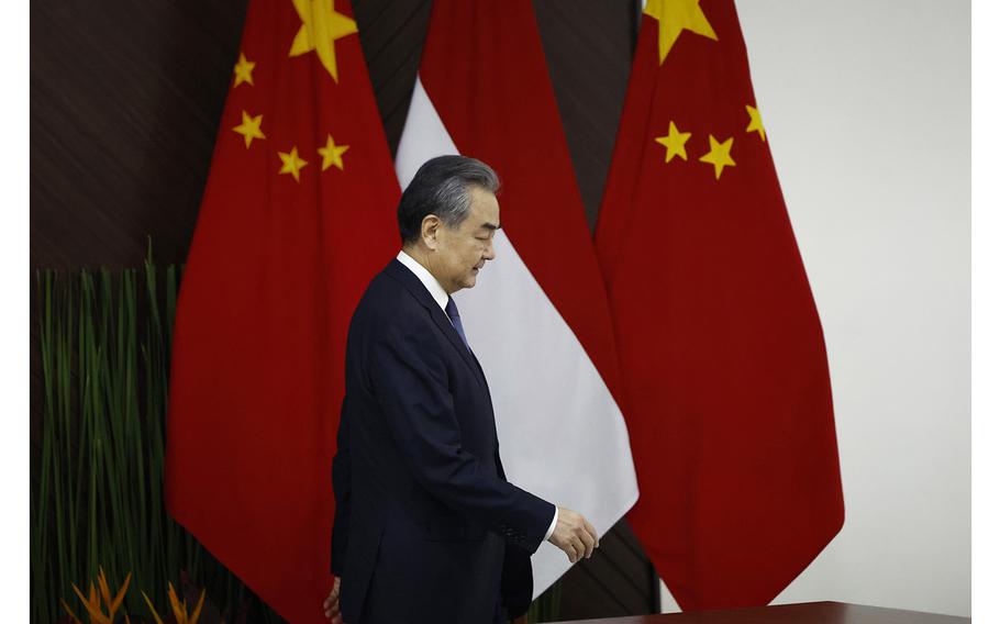 Chinese Foreign Minister Wang Yi arrives for a bilateral meeting with Indonesian Foreign Minister Retno Marsudi in Jakarta, Indonesia, Thursday, April 18, 2024. 