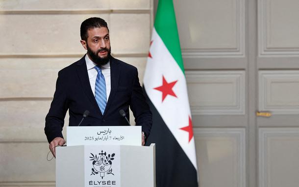 Syrian President Ahmed al-Sharaa speaks during a joint press conference with French President after a meeting at the Elysee Palace in Paris, on May 7, 2025. Syrian interim President Ahmed al-Sharaa arrived in Paris on May 7, state media reported, on his first visit to Europe since overthrowing longtime ruler Bashar al-Assad in December. (Stephanie Lecocq/POOL/AFP via Getty Images/TNS)