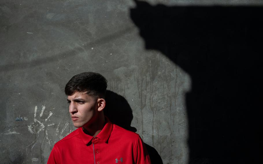 Noah Bseso, 17, stands outside his home in the Isawiya neighborhood of East Jerusalem on Thursday, Nov. 30, 2023, two days after his release from Israel’s Damon Prison.