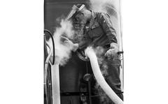 Norm Zeisloft/Stars and Stripes
Stuttgart, Germany, July, 1962: A crew member handles the liquid oxygen line to a Redstone missile during an exercise at Panzer Kasern in Stuttgart. The dependable 70-foot Redstone, added to the USAREUR arsenal in 1958, had a range of up to 200 miles; it was also the vehicle used for the first two American manned spaceflights. 