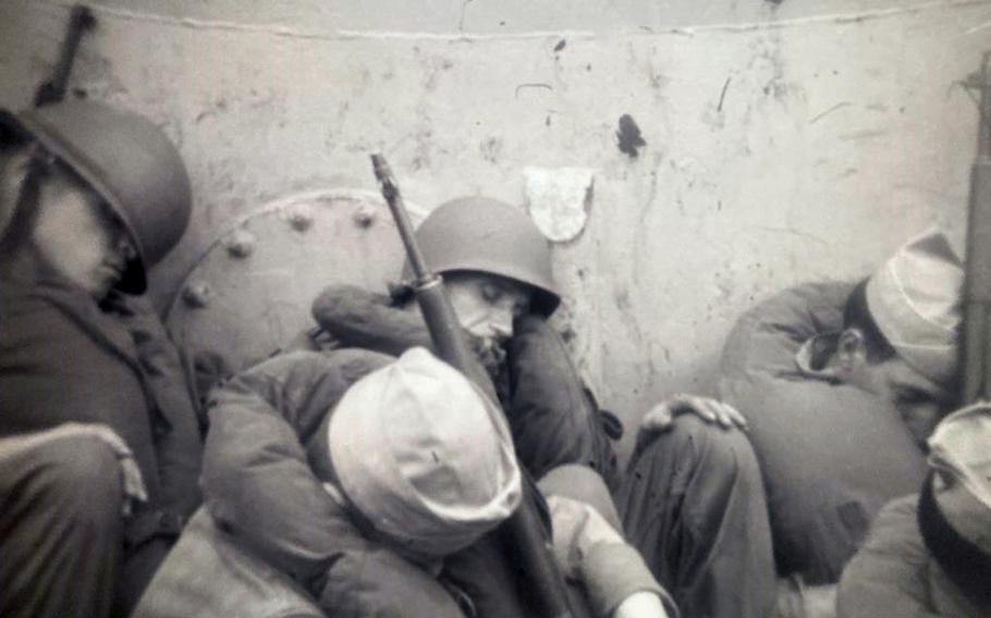 American soldiers catch up on rest in this undated image from the Korean War. 