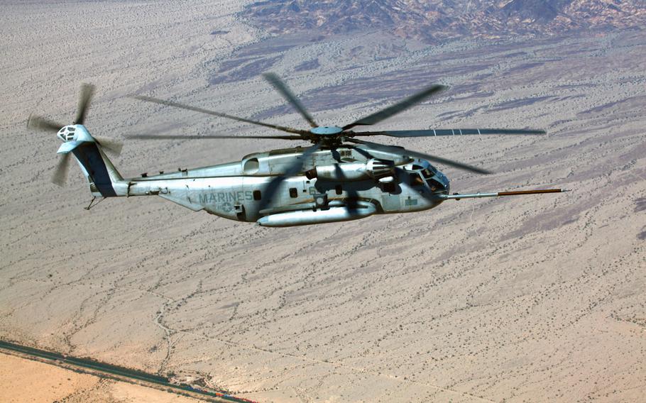 An undated photo of a CH-53E Super Stallion helicopter of Marine Heavy Helicopter Squadron 361 flying over desert in the southwestern United States.