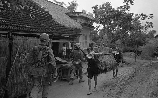 Hed: On a mission, 1968

Soldiers move through a village north of Chu Lai.12th Infantry Regiment troops had been moving 1000 meters West along a road leading through the Que Sanh valley with the objective to take a hill from the Viet Cong operating in the area.  

Looking for Stars and Stripes’ coverage of the Vietnam War? Subscribe to Stars and Stripes’ historic newspaper archive! We have digitized our 1948-1999 European and Pacific editions, as well as several of our WWII editions and made them available online through https://starsandstripes.newspaperarchive.com/

META TAGS: Pacific; Vietnam War; South Vietnam; patrol; servicemember; soldier; 1st Cavalry; U.S. Army; 12th Infantry Reg; 1st Cav.; cavalrymember; village; locals; Vietnamese