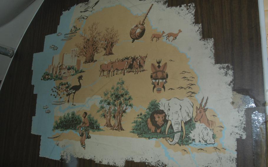 A map of Senegal, complete with drawings of the country’s rich animal habitat, adorns the wall of the Senegalese Air Force’s Focker 27 airplane.
