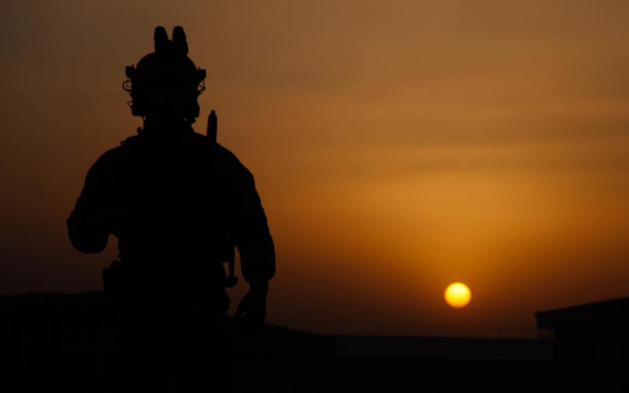 A U.S. Special Forces soldier waits for nightfall to start an operation in Laghman province, Afghanistan, in 2016. 