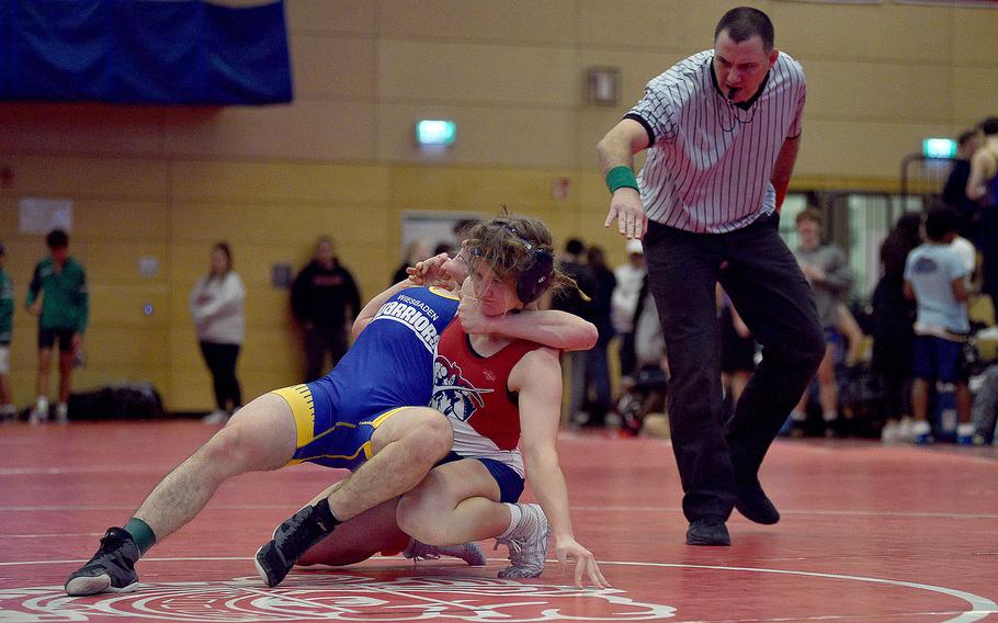 Lakenheath's Sophia Yorko tries to break out of the grip of Wiesbaden's Alex Brookhart during a 150-pound match at a wrestling meet on Dec. 9, 2023, at Kaiserslautern High School in Kaiserslautern, Germany.
