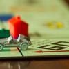 Boise, USA - November 18, 2012: BOISE, IDAHO - NOVEMBER 18, 2012: Car from the game Monopoly speeding past. Game was made by Parker Brothers now owned by Hasbro