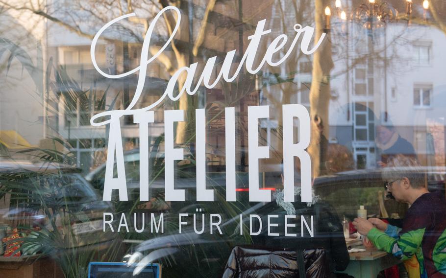 The front window of Lauter Atelier on the corner of Pirmasenser Strasse and Humboldtstrasse in Kaiserslautern, Germany. 