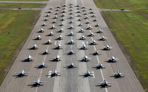F-16 Fighting Falcons, F-22 Raptors and F-35 Lightning IIs take part in a large formation exercise at Eielson Air Force Base, Alaska, Aug. 12, 2022. 