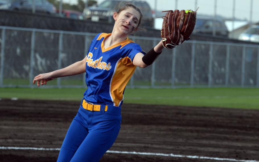 Gracie Kenney catches.