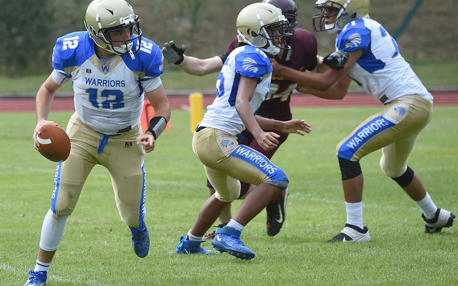 Wiesbaden Warriors’ quarterback Logan Hall looks to find open receivers before throwing the ball down field. 