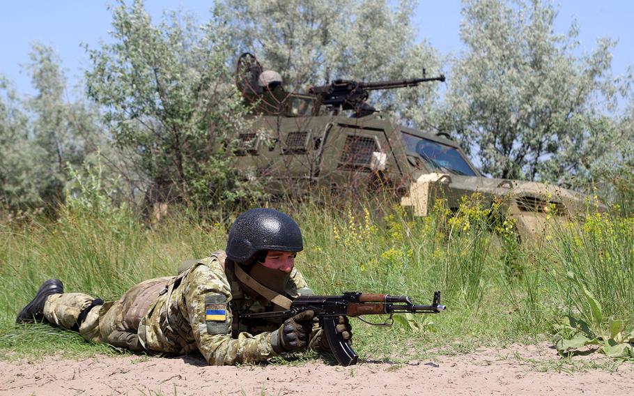 A Ukrainian army soldier takes part in the Sea Breeze drills at the shooting range in the Kherson region of Ukraine on July 2, 2021.